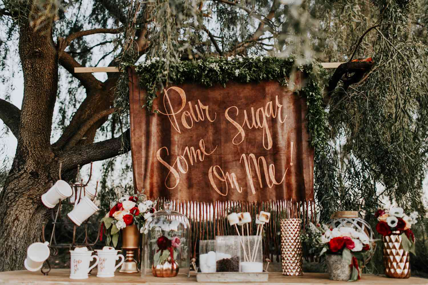 Warm your guests' hearts with a delightful hot cocoa bar with an array of toppings