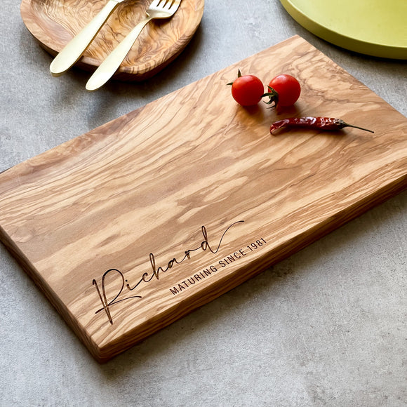 Combine practicality and sentimentality by gifting a personalised cutting board 