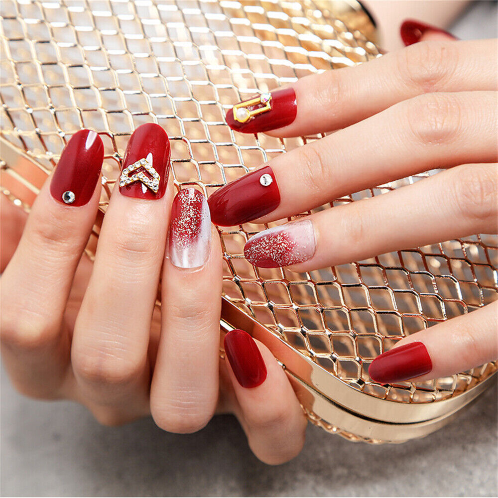 Make a bold statement with classic red nails, symbolising passion and romance