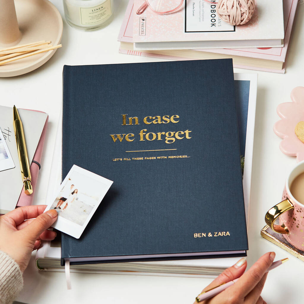 Craft a personalised memory book filled with photos, mementos, and heartfelt messages