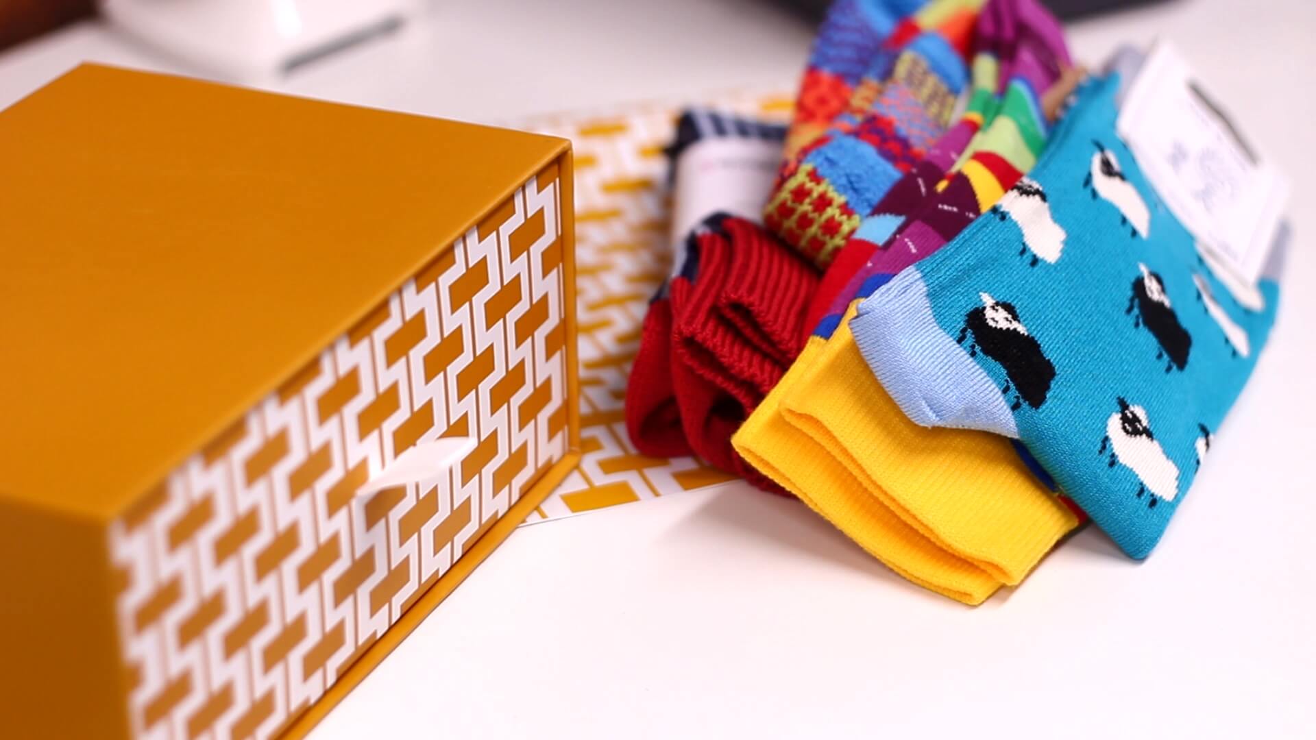 Surprise your friend with a silly sock set featuring playful patterns or mismatched designs