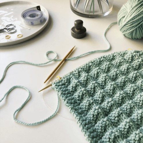 Showcase your knitting skills by gifting a cosy hand-knitted scarf