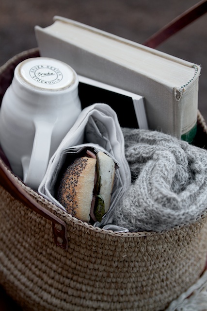 Curate a gift basket with items related to his favourite books or genres