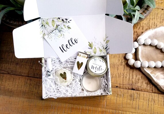 Place a small, thoughtful gift inside a prank gift box with a funny theme