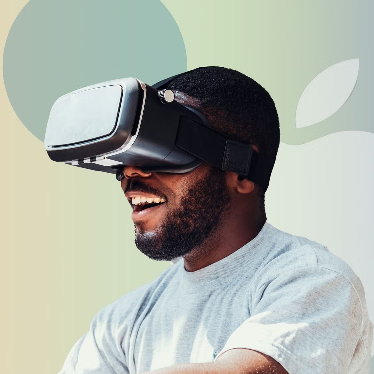 man smiling and wearing a vr headset